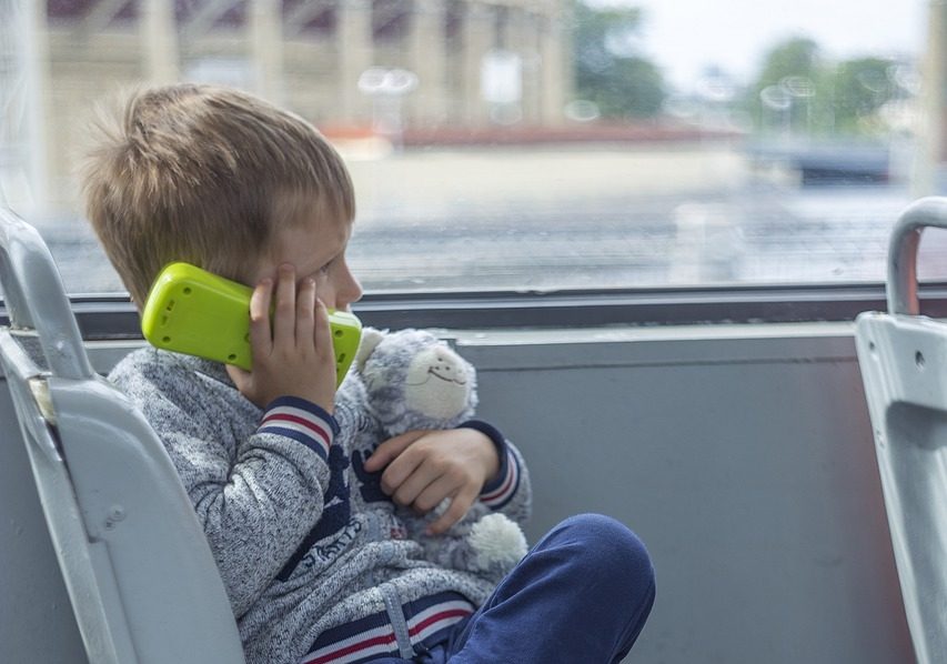child, bus, phone